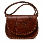Model wearing Handmade Nefertiti Leather Crossbody Bag - Brown - ASL Egypt