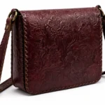 Detail view of Handmade Floral Embossed Leather Crossbody Bag - Burgundy - ASL Egypt