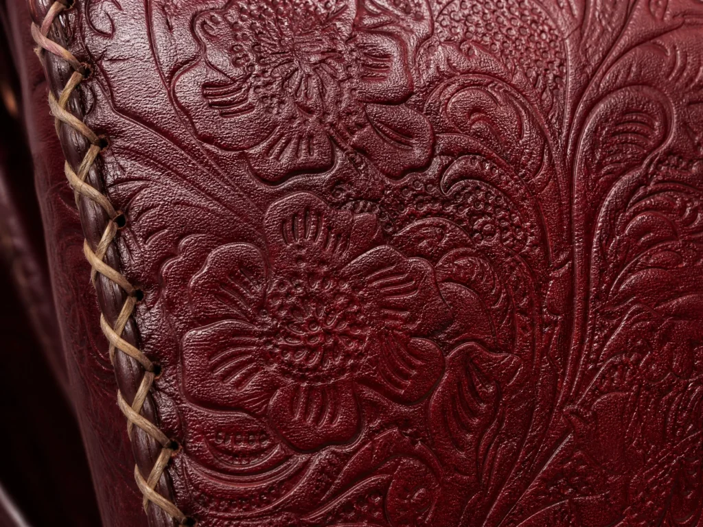 Side view of Handmade Floral Embossed Leather Crossbody Bag - Burgundy - ASL Egypt