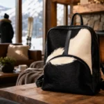 Model wearing Handmade Leather Cowhide Backpack - Black and White - ASL Egypt