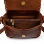 Model wearing Handmade Egyptian Leather Saddle Bag - Tan Brown - ASL Egypt