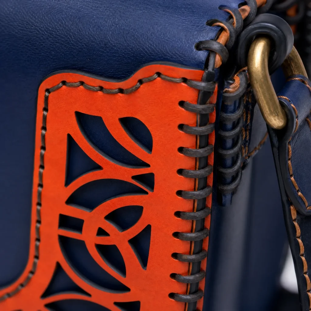 Back view of Handmade Leather Crossbody Bag - Navy and Orange Filigree - ASL Egypt