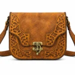 Detail view of Handmade Leather Crossbody Bag - Filigree Cut-Out - ASL Egypt