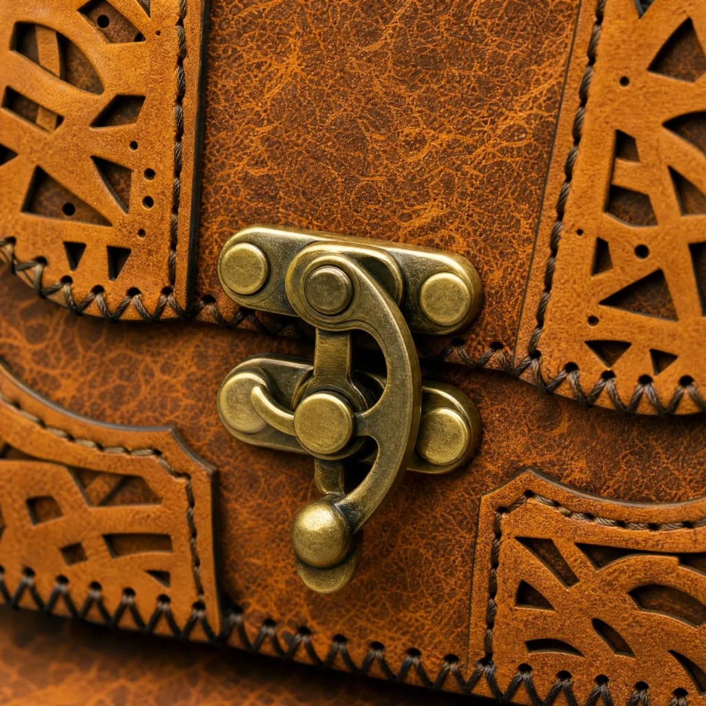 Side view of Handmade Leather Crossbody Bag - Filigree Cut-Out - ASL Egypt