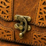 Side view of Handmade Leather Crossbody Bag - Filigree Cut-Out - ASL Egypt